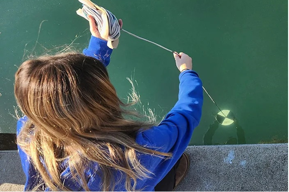A women conducting water testing.
